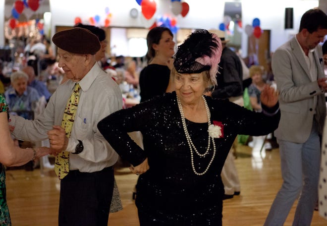 Phyllis Meserlian hits the dance floor at the Ethos Senior Prom held Friday afternoon at the Irish Social Club in West Roxbury.