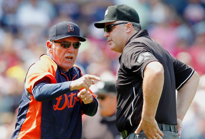 Tigers manager Jim Leylandargues with first base umpire Tim Brookens after being ejected in the third inning of the Red Sox' 7-4 victory on Monday afternoon at Fenway Park.