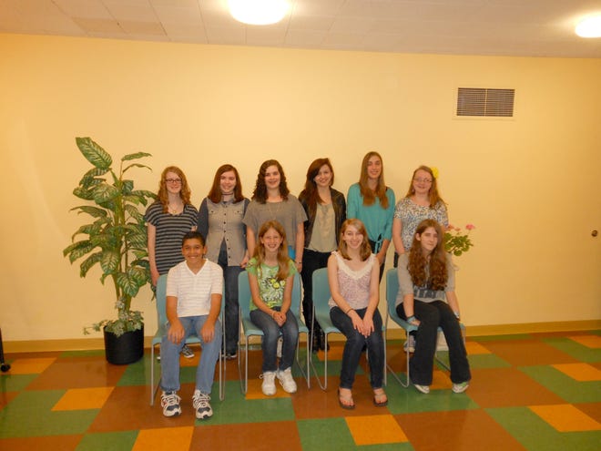 The winners in the Marlborough Public Library’s Teen Writing Competition include, standing, left to right, Laura Cattarin, Colleen McCarthy, Kayla Ucciferri, Kristen Higgins, Maddy Plante and Elizabeth Smith; and sitting, left to right, Justin Hernandez, Erin Giugno, Courtney Armijo and Katie Zagzoug.