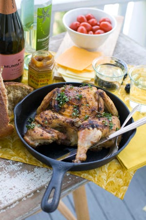This April 30, 2012 photo, shows a recipe for Cast Iron Skillet Roasted Chicken in Concord, N.H. (AP Photo/Matthew Mead)