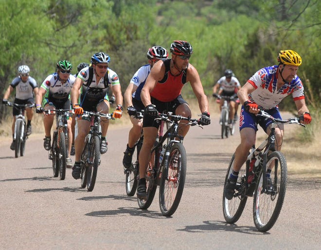 Bikers race in 2011's 24 Hours in the Canyon at Palo Duro Canyon State Park. This year's events begin Friday.