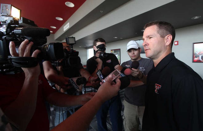 Texas Tech interim baseball coach Tim Tadlock speaks to the media Wednesday at Rip Griffin Park. Tadlock, who is a candidate for the job, is handling all the duties of the program while athletic director Kirby Hocutt conducts a search.