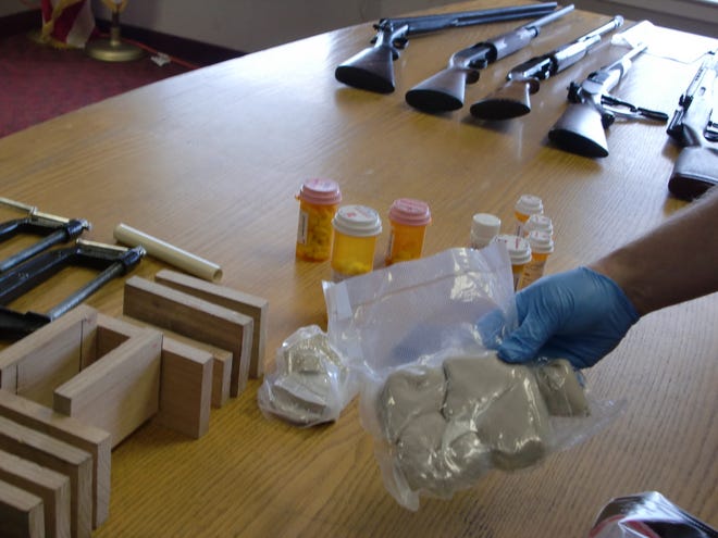 Drugs and weapons were seized during a series of coordinated drug raids throughout southeastern Massachusetts and Rhode Island on Thursday morning.