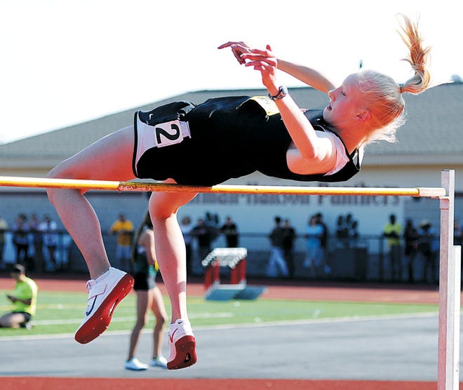 Karla Ganley clears her mark in the girls high jump at the Division 2 State Championship Meet at Whitman-Hanson High on Sunday.