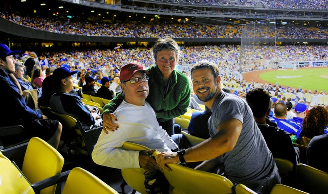 Jim and Barb Shea of Springfield and their son, Justin, attend a game May 15 at Dodger Stadium in Los Angeles. Jim was diagnosed with a serious illness in 2009. Being baseball fans, and wanting to spend more time together, they rented an RV to drive to all 30 major league ballparks in 50 days.
Photo courtesy Justin Shea