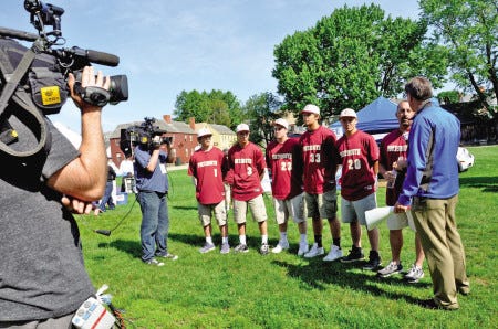 Portsmouth High School's baseball team was invited to join FOX 25 Morning News' Zip Trip as the show was filmed live Friday morning at Strawbery Banke. Being interviewed by the show's co-host Gene Lavanchy are coach Tim Hopley, far right and Portsmouth High seniors, left to right, Matt Fenney, Billy Hartmann, Evan Pugliese, Kyle DiCesare and Connor McCauley.
