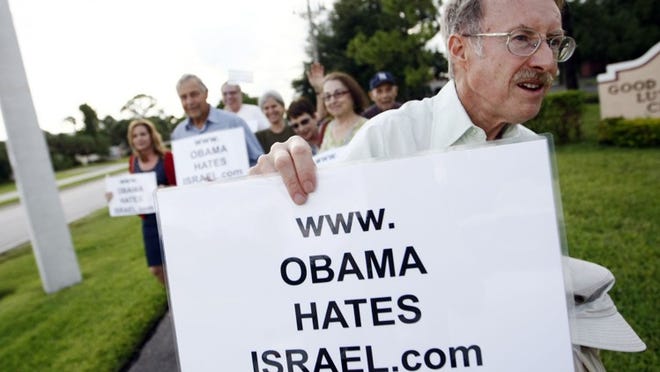 Allan Ward of Boca Raton joined others in a protest outside B'Nai Torah Congregation.