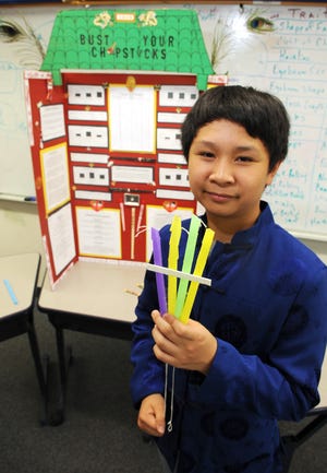 Plouffe Academy student Calvin Van, 13,   studied different types of chopsticks for his science project and participated in a state competition on Saturday.