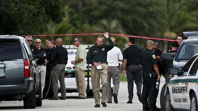 Palm Beach County Sheriff Ric Bradshaw was among the many PBSO officers investigating the scene of a shooting Saturday afternoon near the intersection of Forest Hill Blvd and Congress Ave.