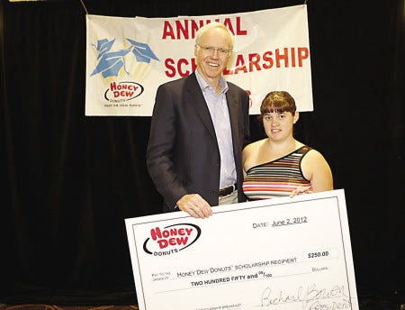 Amy Strong. a Hampton resident and graduating senior from Winnacunnet High School, was awarded a $250 college scholarship by Honey Dew Donuts founder Richard Bowen at a ceremony held at the Sheraton in Needham, Mass., June 2. Strong will attend Rhode Island College in the fall. Each year, Honey Dew Donuts awards more than $25,000 in scholarship money to graduating high school seniors from Honey Dew Donuts’ franchise communities throughout New England. To be eligible, students had to demonstrate academic excellence by maintaining a grade point average of B- or better, be accepted into a four-year accredited college or university, and participate in community service activities.