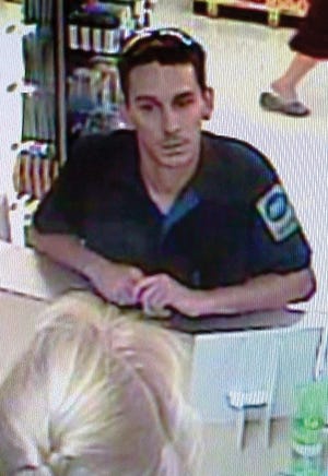 Suspect caught on Safeway surveillance in a robbery