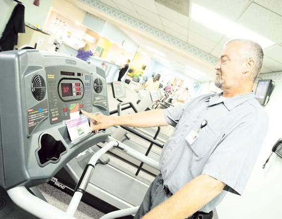 Pekin Hospital employee Bernie Artman says that his weight loss has given him addition energy in addition to a healthier overall feeling. Josh Bradshaw / Times staff