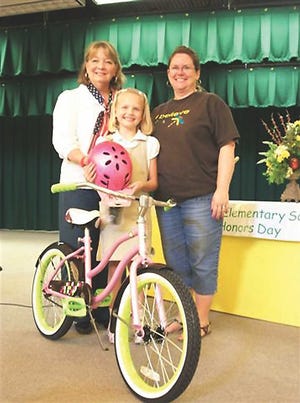 Photo courtesy of Exchange Club of EffinghamAubrey Roberts was the winner of the Exchange Club of Effingham's Quick-Think-A-Thon. Presenting Roberts her prize of a new bike, is Yvette Carr, president of the Exchange Club of Effingham County, and Aubrey's teacher, Kelley Martin. Martin is also the teacher for the tournament's third runner-up, Sam Reiser. For more information on the Exchange Club of Effingham County and their support of the local community, please call Yvette Carr at 657-5423 or Lucille Tate, Vice President, at 978-0769.
