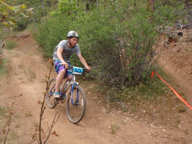Wyatt Finley of Fort Jones rides his bike during the Humbug Hurry-Up Mountain Bike Race last year.