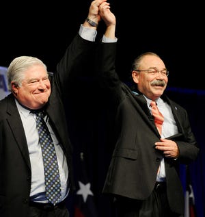 Outgoing Texas Democratic Party chairman Boyd Richie, left, stands with newly elected chairman Gilberto Hinojosa on Saturday at the Texas Democratic Convention in Houston.