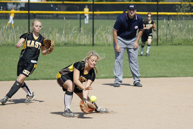 Junior Hannah Lane fields a ball during Zeeland East's game against Sparta on Wednesday afternoon.