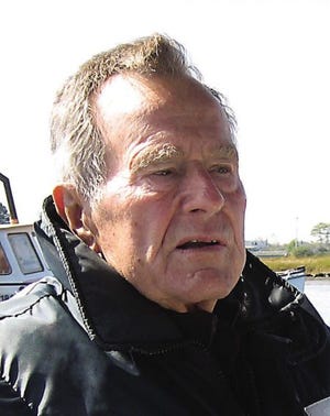 This undated image released by HBO shows former President George H.W. Bush on his boat in Kennebunkport, Maine, during the filming of the documentary "41," premiering Thursday, June 14, at 9 p.m. EST on HBO.