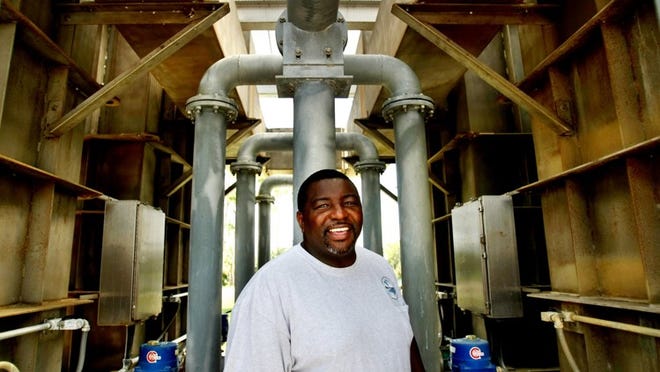 Sheldon Primus, plant superintendent, Loxahatchee River District in Jupiter. Primus was recently awarded the Florida Water and Pollution Control Operators Association David B. Lee Award.(Gary Coronado/The Palm Beach Post)
