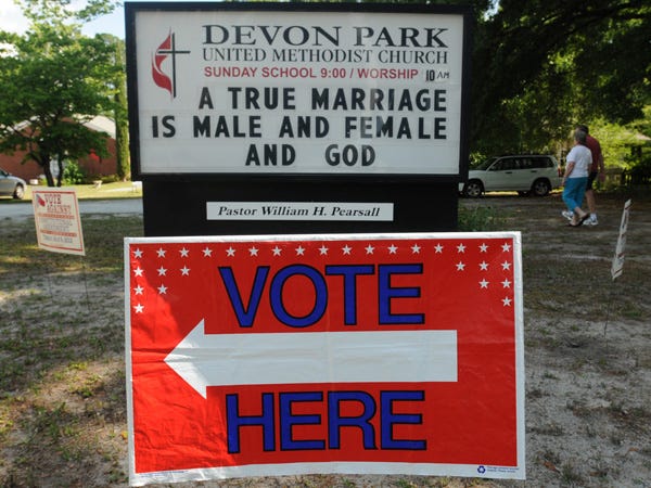 A sign in front of the Devon Park United Methodist Church polling site reads "A TRUE MARRIAGE IS MALE AND FEMALE AND GOD" Tuesday May 8, 2012 in response to Constitutional Amedment to provide that marriage between one man and one woman is the only legal union valid in North Carolina. Staff Photo By: Ken Blevins/StarNews Media