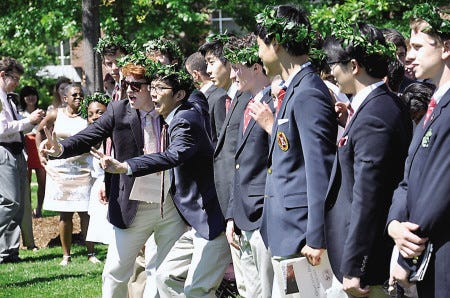 A couple of graduates of Phillips Exeter Academy's Class of 2012 ham it up during the processional Sunday, June 10. Suzanne Laurent/Photo.