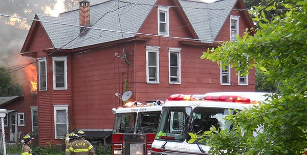 Several tenants were displaced when a fire damaged this Prospect Street apartment building in East Stroudsburg on Monday evening, June 11, 2012. Police said the fire was caused by grease in a frying pan in the kitchen.