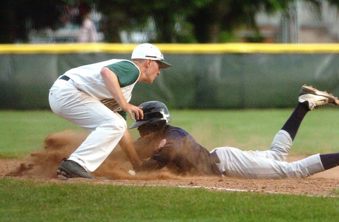 Danielson's Ryan Cahill gets New London's Aaron Hill out at third base Monday during an American Legion game at Owen Bell Park in Dayville. New London won, 7-4, in nine innings.