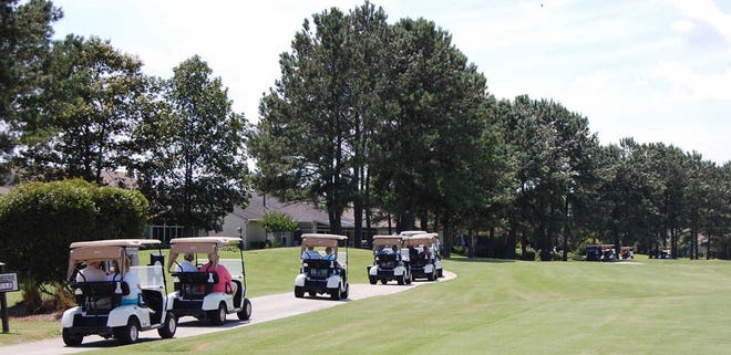 Courtesy of Sun City Community Association More than 177 residents ventured out on the Hidden Cypress Golf Course June 5. The Golf Advisory Committee organized a tour of the course while it was closed for aerification. The course reopened Saturday.