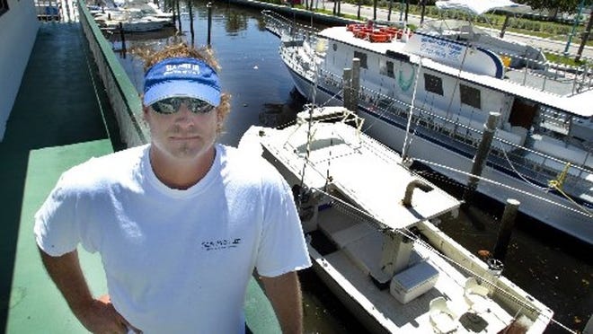 Burt Garnsey, founder of the downtown Marina Association and part owner of Sea Mist Enterprises at the Boynton city marina in 2003.