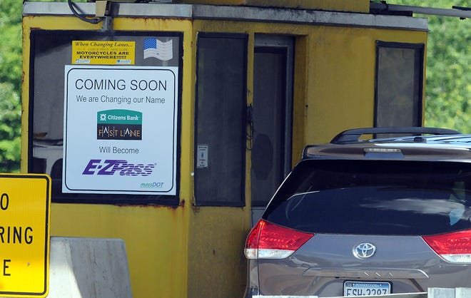 A sign on a Mass Pike toll booth at Exit 11 in Hopkinton announces the change from Fast Lane to E-ZPass.