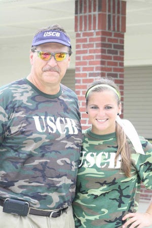 Courtesy of USC Beaufort USCB second baseman Katie Rietkovich, right, transferred from the University of Georgia last summer to play for her father, Ty, in the Sand Sharks' inaugural season.