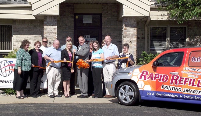 On Friday, June 8, at 10 a.m., Rapid Refill Ink had a ribbon cutting ceremony. Hillsdale County Chamber members were present to host the event. Pictured at the ceremony are Karri Doty, Kathy Spence, Tony Ginolfi, Doug Baker, Dena Walters, Jeff Layman, Jason Walters, Nicole Conklin, Lynn Burkett, Bill Walters, Amber Holden and Ruth Brown.