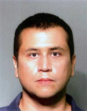 FILE - This file booking photo provided by the Seminole County Sheriff's Office shows George Zimmerman. The former neighborhood watch volunteer who killed Trayvon Martin told his wife to buy bulletproof vests for them and for his attorney, according to jailhouse calls released Monday, June 18, 2012. "As uncomfortable as it is, I want you wearing one," George Zimmerman told his wife. (AP Photo/Seminole County Sheriff's Office, File)