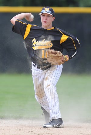 Hawkeye second basemen James Sullivan, throws out a Sandwich runner at first base during their game on June 18, 2012, at Bridgewater State University.