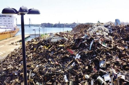 Grimmel Industries has been fined for pollutants from these scrap piles.