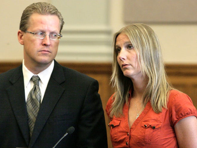 IndeOnline.com / Glenn B. Dettman
Attorney Michael Boske looks to his client Stacey St. Jean-Barton as she pleads guilty before Judge Charles Brown.