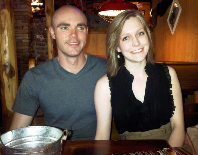 Ryan Timoney sits with his girlfriend, Kelby Sims, at a restaurant outside of Lawton, Okla., a few week before he was deployed. Contributed photo