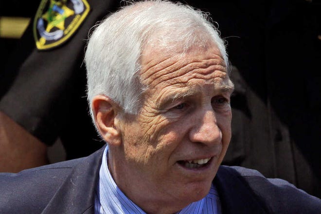 Jerry Sandusky leaves the Centre County Courthouse in Bellefonte, Pa., on Wednesday.