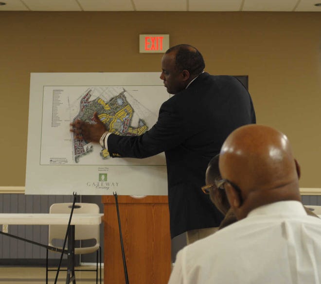 Gwyneth J. Saunders/Hardeeville Today Charles Washington, a co-developer with Gateway Development Partners, describes the different phases of construction that will take place at Gateway Crossing djring a public meeting held Monday in the Hardeeville community room.