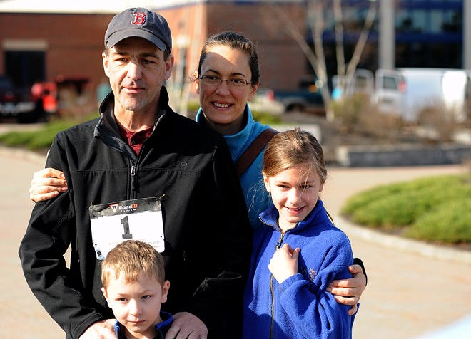 The Fishers. Jonathan with wife Ellen and children Nathan and Evelyn, at April's Fisher's Feat 5K Run/Walk fund-raiser at Exeter High School.