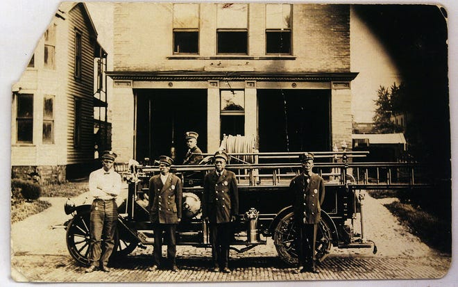 In an undated photo, firefighters stand for a portrait in front of the original Firehouse No. 5, at 1310 E. Adams St. Springfield Illinois African History Foundation .Photo courtesy of the Springfield Illinois African History Foundation
