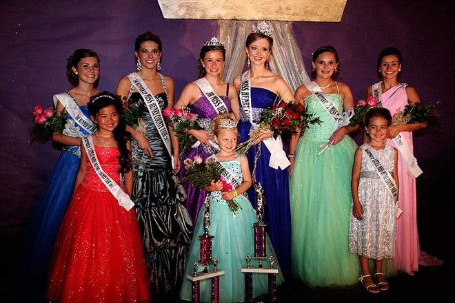 The 2011 newly crowned Miss Henry County Fair, Dana Brock, takes a moment following the pageant to pose with her entire court. Pictured from the left in the front row is Little Miss first runner-up Olivia Egert, of Geneseo; 2011 Little Miss Henry County, Addison Dykstra, Geneseo; and Little Miss second runner-up Carmen Stahl, of Cambridge. In the back row is Junior Miss first runner-up, Danielle Strouss, Geneseo; Miss Henry County first runner-up, Victoria Addis, Annawan; Junior Miss, Allison Meyer, Cambridge; Miss Henry County Fair, Dana Brock; Junior Miss second runner-up, Jordan VanMelkebeke, Kewanee; and Miss Henry County second runner-up, Hailey Clark, of Cambridge.