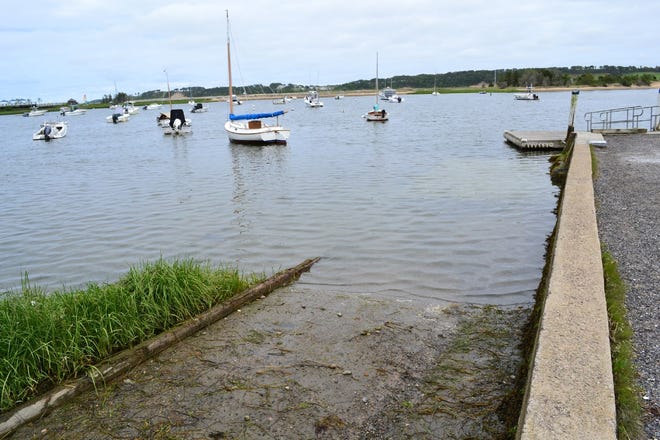 After an increase in use resulted in damage to the bottom of the Round Cove boat ramp, the town recently repaired a portion (under water in this picture) and is also looking at imposing new restrictions on who can use the ramp.