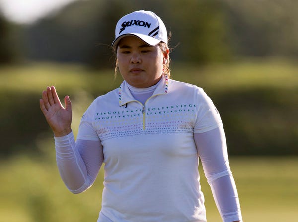 Inbee Park waves to the gallery after saving par on the seventhth hole during the second round of the LPGA Classic in Waterloo, Ontario. (Frank Gunn | Associated Press)