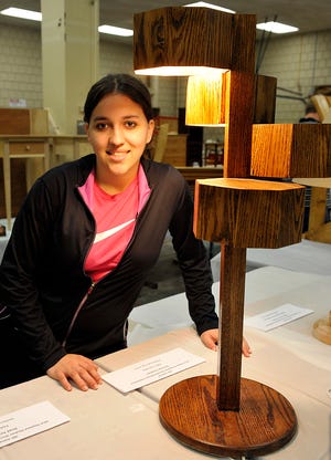 Marlborough High student Brenda Gusmao made this four-way oak lamp.