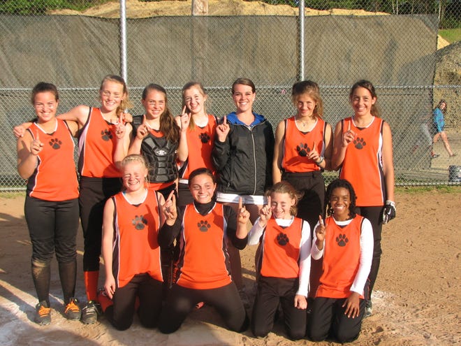 The Ipswich Rebels consisted of, from left to right, in the front row, outfielder Caitlyn Scola, third baseman Caroline Kaucher, outfielder Angela St. Peter, outfielder Tierra Pryor-West; in the back row, shortstop Carly Coughlin, pitcher Sydney Law, catcher Skylar Hambley, first baseman Lizzy Cressey, coach Kerry Desmond, second baseman Sophia Rugo, outfielder Dakota Walker. Missing from photo: Outfielder Sophia Radzim, coaches Doug Law, Jim Coughlin, Tim St. Peter, Mary Pryor, and Paul Desmond.