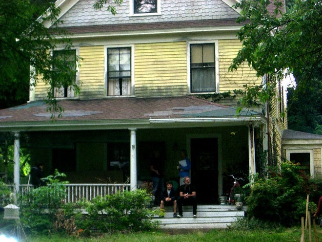 A film crew at work on a house at Piper Road, Acton.