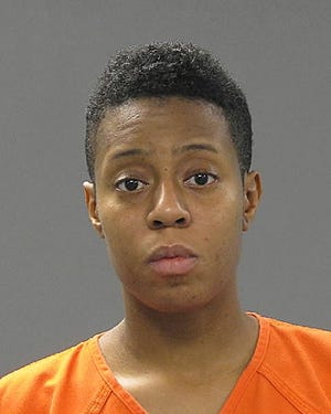 Lisa Jarvis, 32, of Norcross, Ga., accused of stealing $100,000
from a victim's bank account with a copy of a debit card