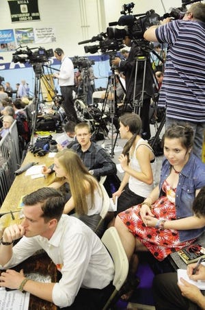 Student journalists from Oyster River High School attend President Barack Obama’s campaign stop at their school Monday.