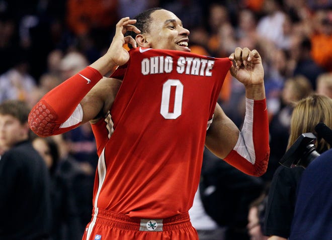 Ohio State forward Jared Sullinger celebrates his team's 77-70 victory over Syracuse in the East Regional final Saturday in Boston.