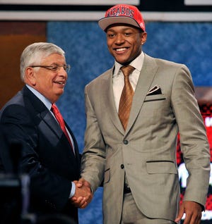 NBA Commissioner David Stern, left, poses with Bradley Beal, who was selected with the third pick by the Washington Wizards in the NBA Draft on Thursday.